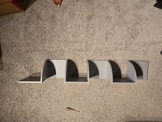 Floating corner wall shelf