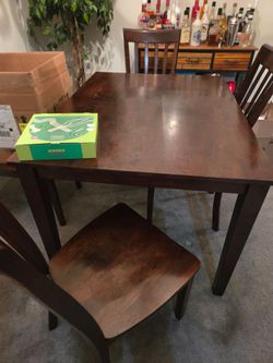 Dark brown table & chairs