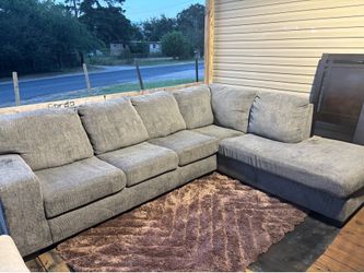 Gray sectional Couches
