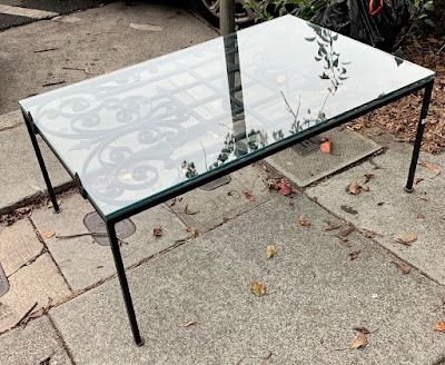 #109879 Glass Top Black Wrought Iron Rectangle Coffee Table 43.5“ L x 27.25“ D x 18“ H