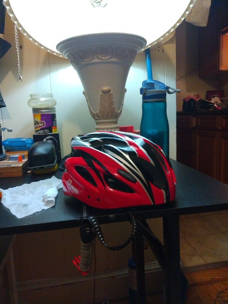 JBM BIKE HELMET. BRAND NEW. NEVER USED. WAS A GIFT.