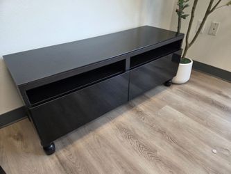 Black TV Stand / Entertainment Center with 2 Large Drawers – Great Condition