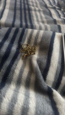 I pad stylist and a gold necklace. I don’t need