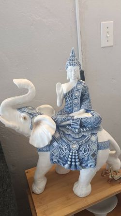 Ancient Buddha sitting on a Elephant