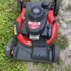 Troy Bilt lawnmower With the big Honda motor the new one that everybody’s looking for and the big wheel this thing is ready to go right now