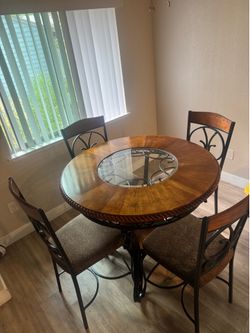 4 chair glass table