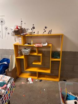 Yellow maze shelf