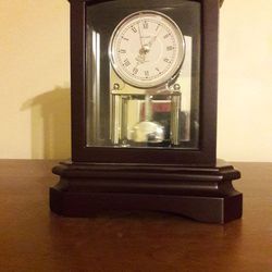 WALLACE SILVERSMITHS wooden mantle clock HM. Nice Condition Mirrored Back. Condition is Used