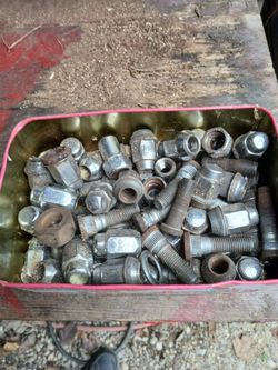 Miscellaneous lug nuts and lug bolts.