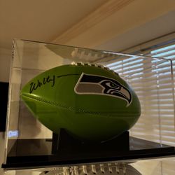 Seahawks Autograph Footballs And Helmets 