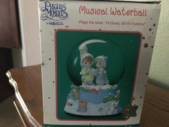 Precious moments musically snow globe