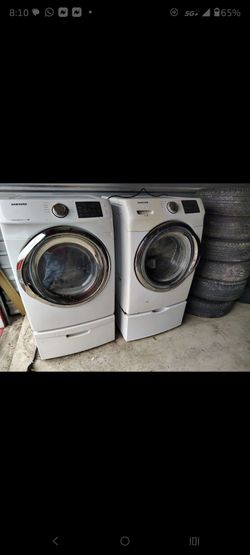 Samsung front loader washer and dryer with pedestal, good for parts  only 150.00