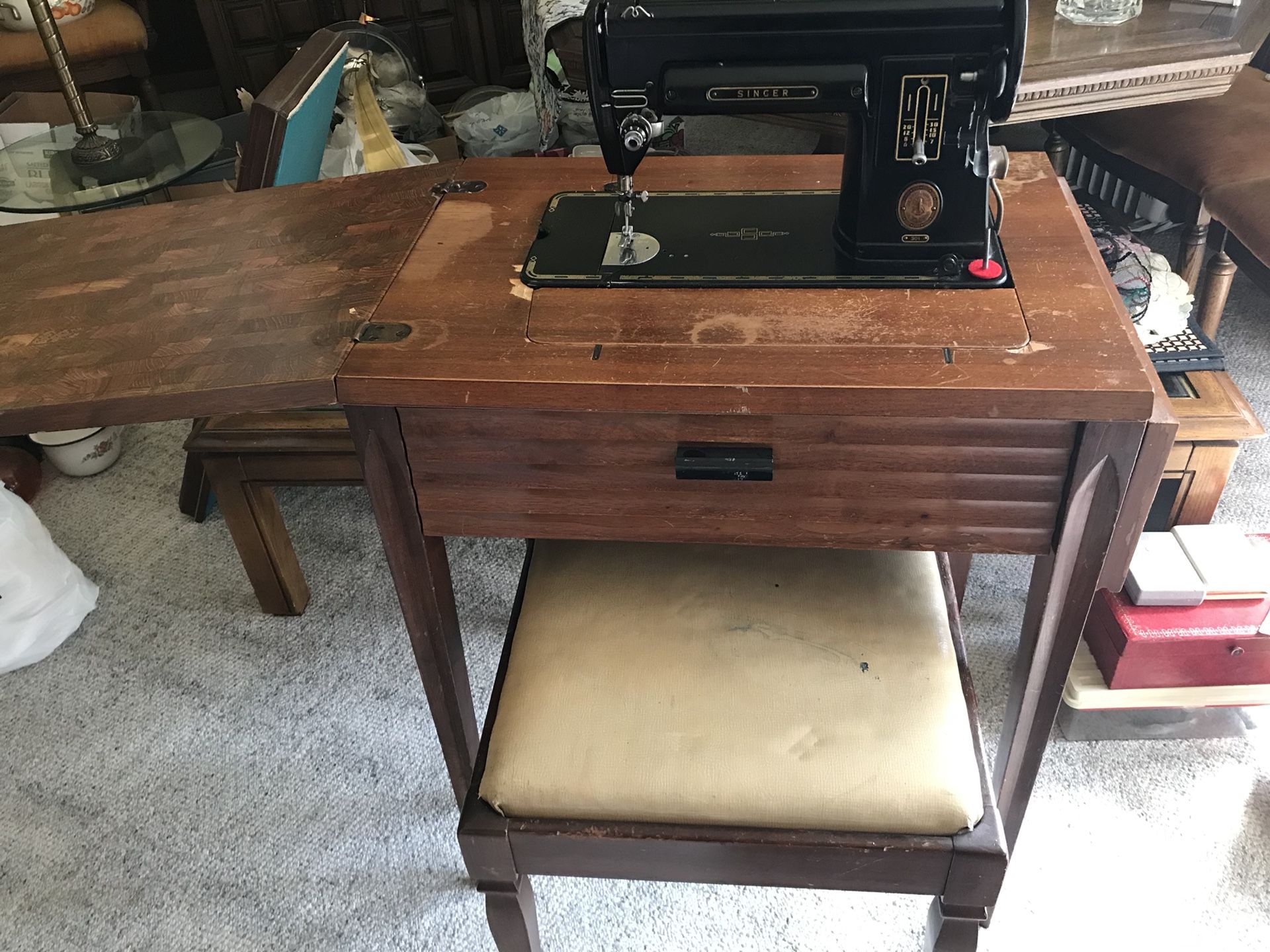 Vintage 1952 Singer 301 sewing machine with hardware cabinet and accessories
