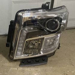 Nissan Titan XD headlight excellent condition taken off a new truck and stored