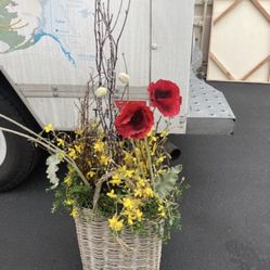 Decorative flower baskets with artificial flowers