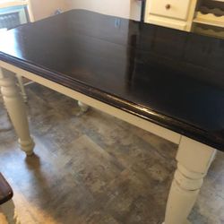 wood dining table, chairs, and buffet table
