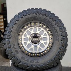 17" Kmc KM549 w/ 35x12.50R17 Toyo Open Country MT tires