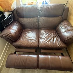 Beautiful brown sofa, foldable, comfortable and has two seats