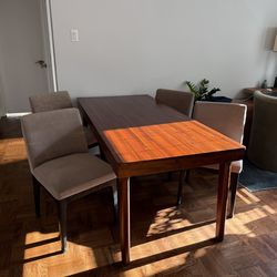 MOVING Wood Dining Table Wayfair