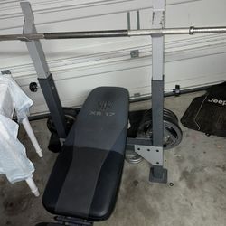 Golds Gym Bench, Bar, & Weights. 