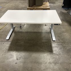 60x30 Teknion standing desk! We Also Have Chairs, Monitor Arms, And File Cabs!