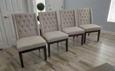 Four beautiful Tufted dining chairs