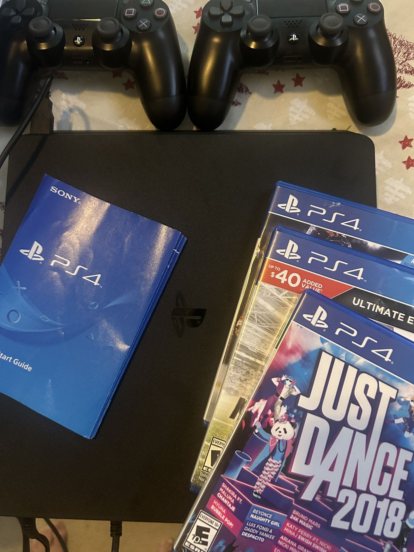 PS 4 With 2 Controllers And 3 Games