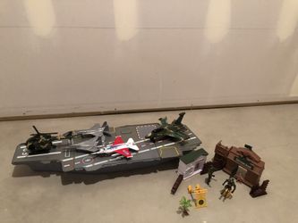 Aircraft carrier playset heavy duty plastic. With extra toys from another military playset and die cast pullback air force plane.