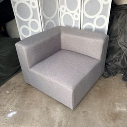 New modern look light gray linen corner chair