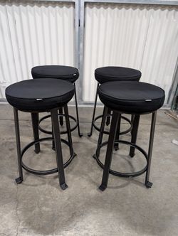 Set of four- Contemporary Black Padded Counter Stool with Dark Metal Frame