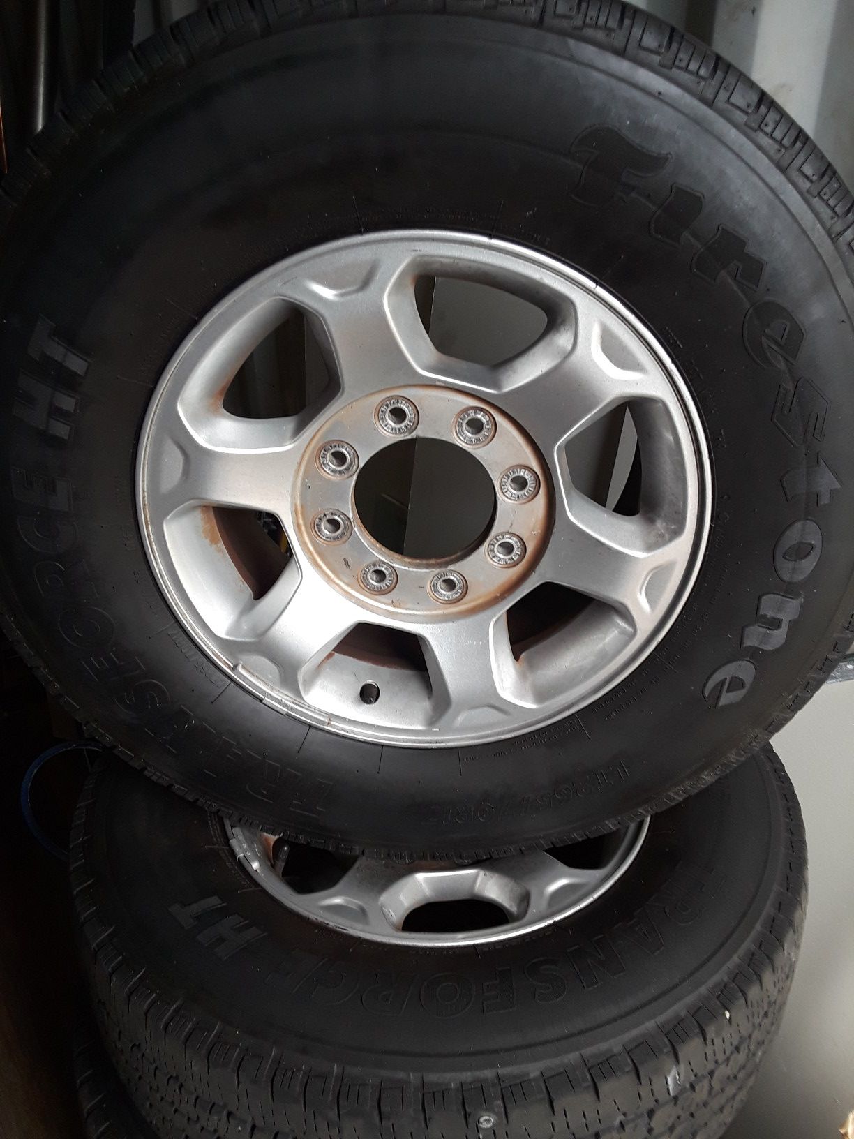 Ford F250 wheels with 265x70x17 Firestone tires