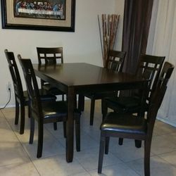 TABLE AND SIX CHAIRS BRAND NEW 