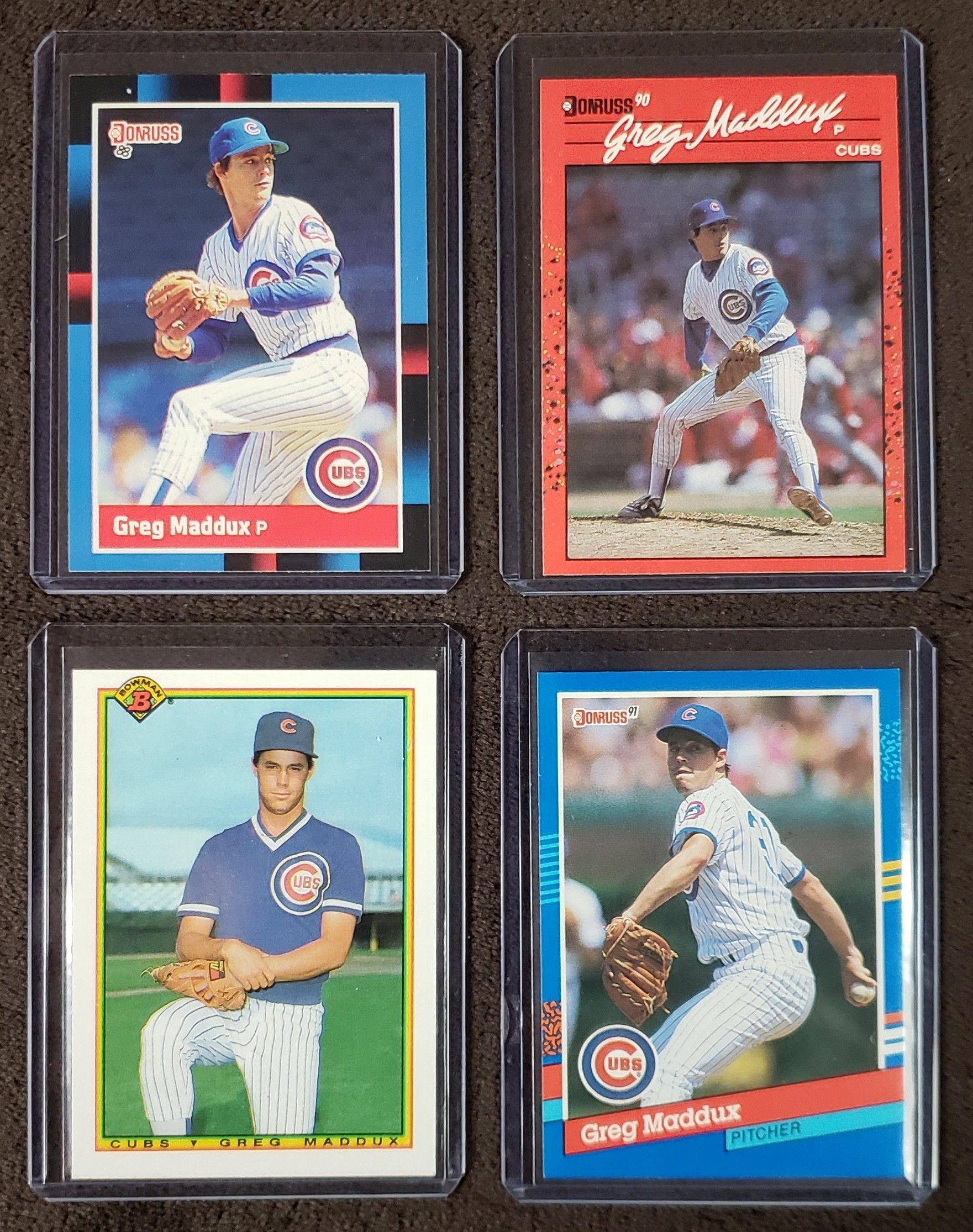 4 Greg Maddux Baseball Cards