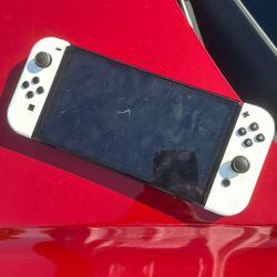 NINTENDO SWITCH OLED + 2 Games 