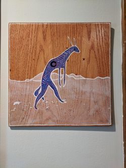 Walking Creature On Wood Art