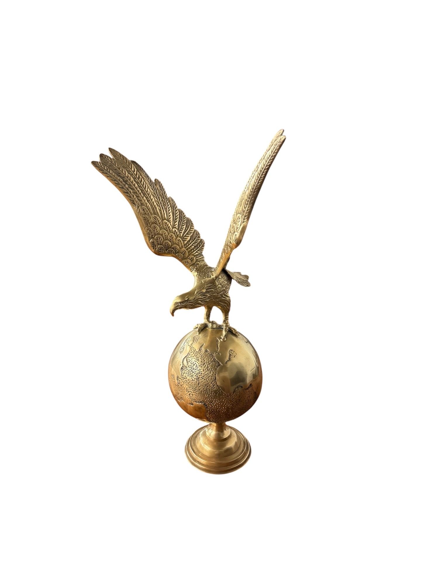 Vintage brass eagle on world statue