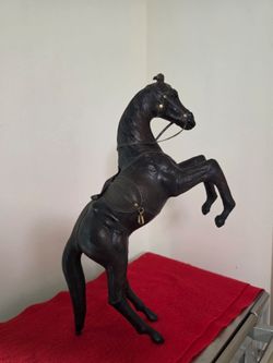 17" Vintage Handcrafted Leather Horse Statue with Brass Accents; has some flaws on the legs and tail.