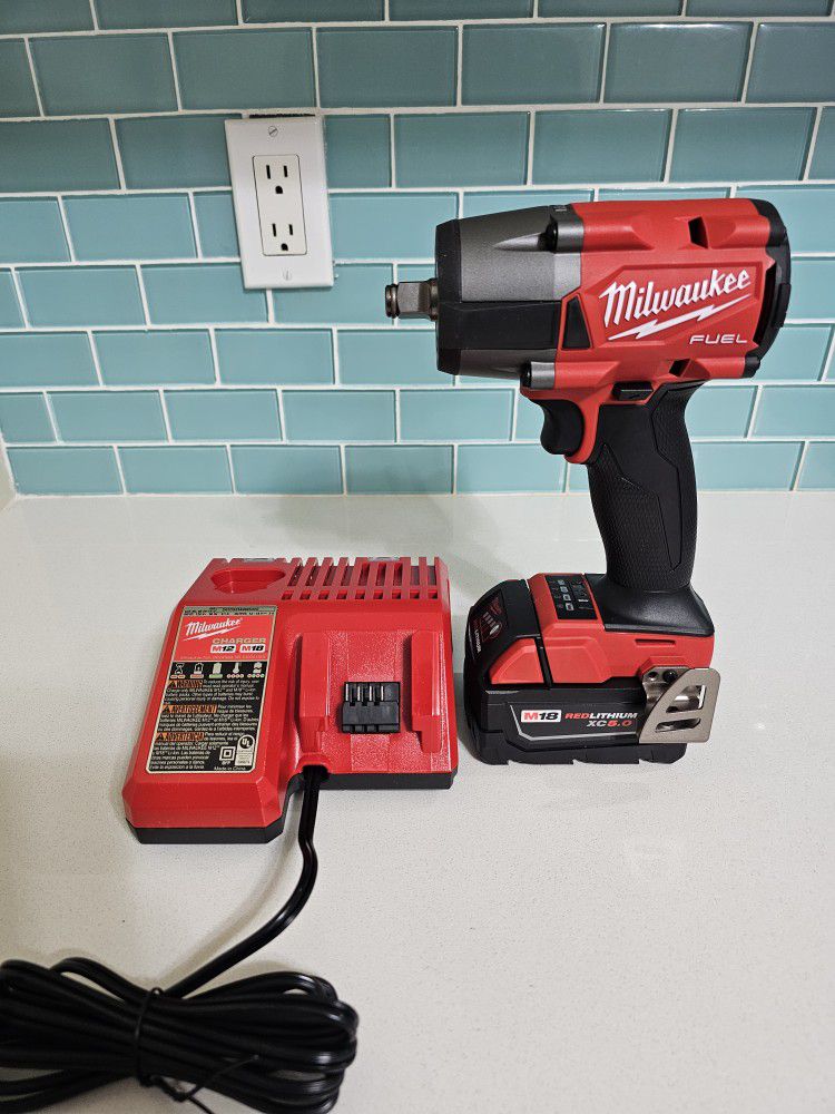Milwaukee M18 impact (2962-20) wrench comes with 5.0 battery and charger brand new never used if the profile is up it is available.