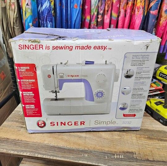Singer 3232 sewing machine appears new in box