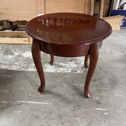 Round Cherry end Table 
23"w x 21"h 
