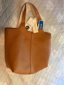 New handbag , has extra little bag inside