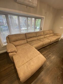 Couch with recliner and long seat