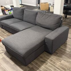 L- Shaped grey couch 