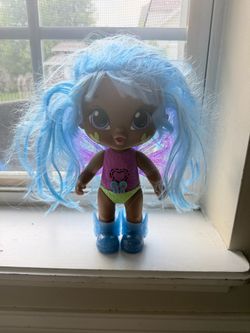 Baby Alive Glo Pixies Doll Gigi Glimmer Interactive 10.5-inch Used / Works. Hair needs a good combing. No accessories except shoes