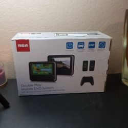 NIB RCA Dual 7" Mobile DVD System With Bonus Controller And Games.

The NIB RCA Dual 7" Mobile DVD System includes two 7" screens, a bonus controller,