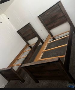Nice two wood twin size beds with mattress