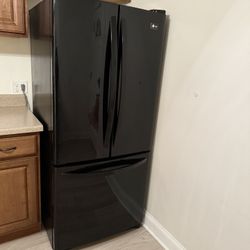 LG FRENCH DOOR REFRIGERATOR. IT MEASURES APPROXIMATELY 30 WIDE BY 33 DEEP AND 69 INCHES TALL. $250.00 OR BEST OFFER. 