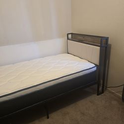 Twin bed with euro pillowtop mattress