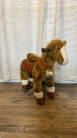 Mechanical ride on pony