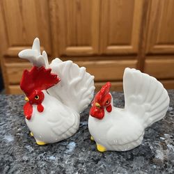 Vintage Porcelain Rooster and Hen Pair of Salt and Pepper Shakers .  Preowned .  A Little tiny bit of the red paint is worn off due to age.  Size tall